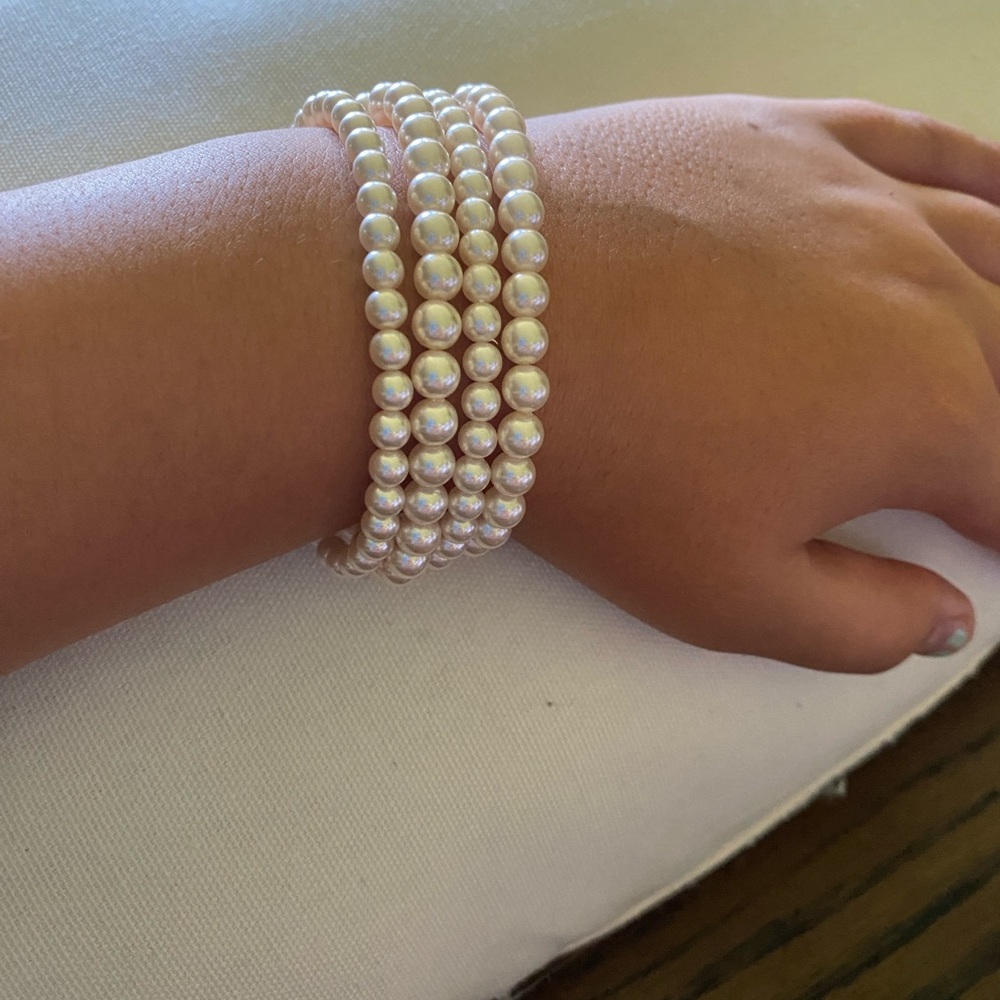 Faux pearl stretch bracelets.